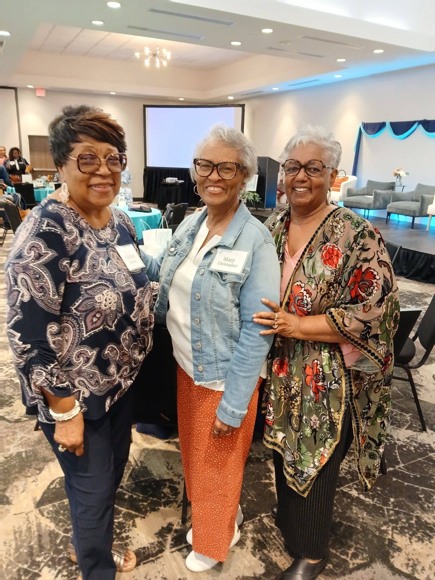 Group of women together at a past Be1 Experience